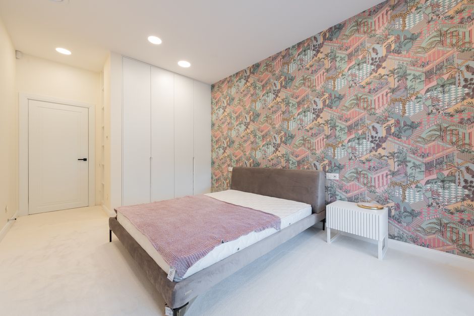 Floor-to-ceiling fitted wardrobes built into a bedroom alcove in West Bridgford